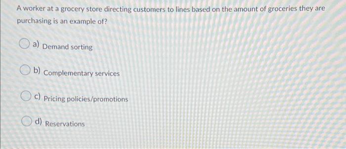 A worker at a grocery store directing customers