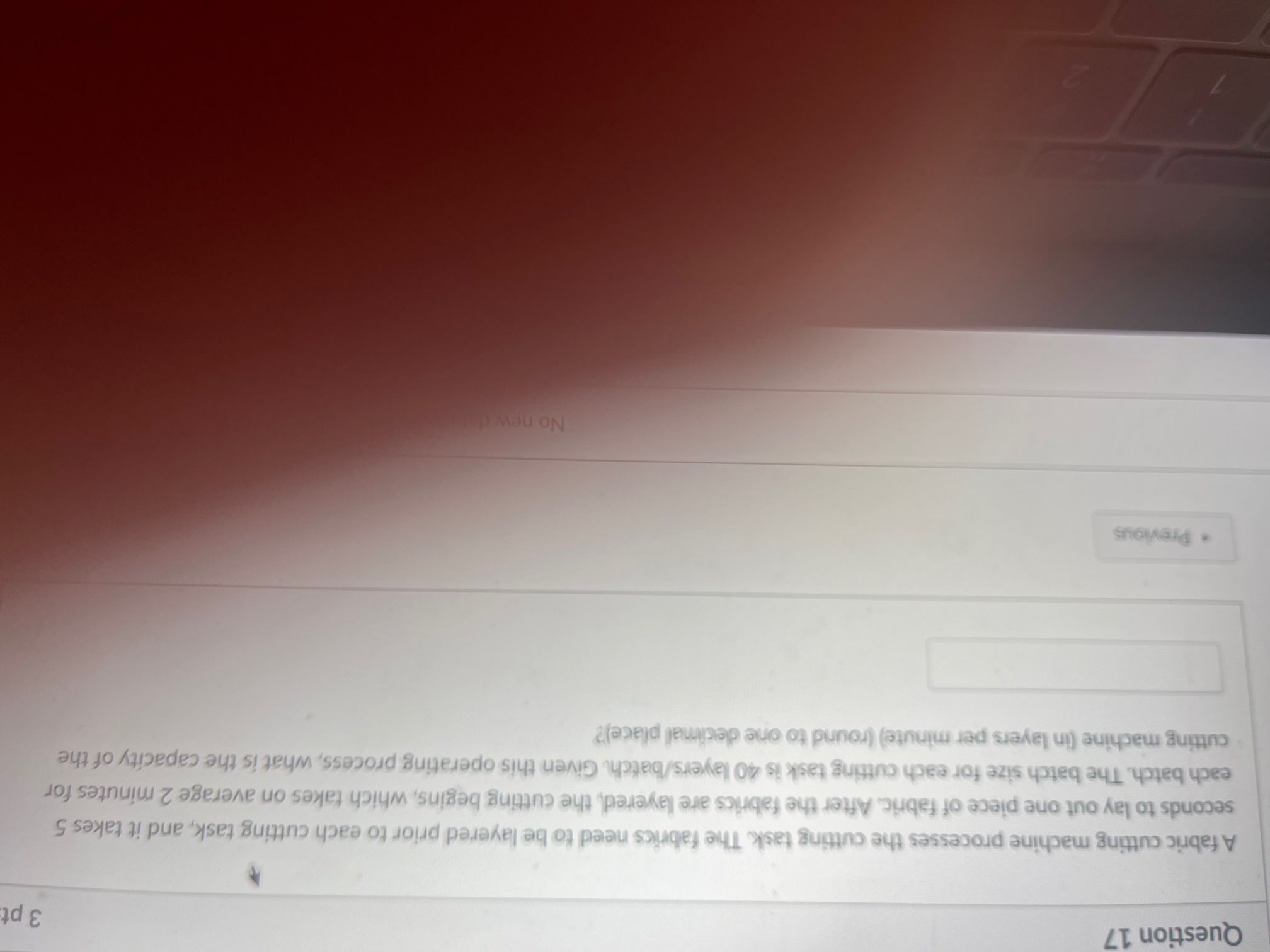 A fabric cutting machine processes the cutting