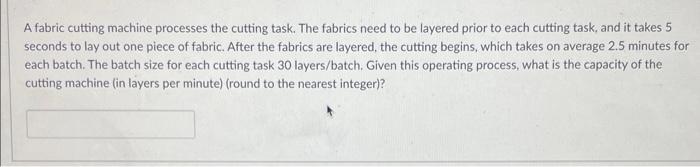 A fabric cutting machine processes the cutting