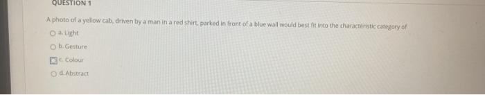 QUESTION 1 A photo of a yellow cab driven by a