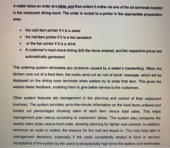 A waiter takes an order at a table and then