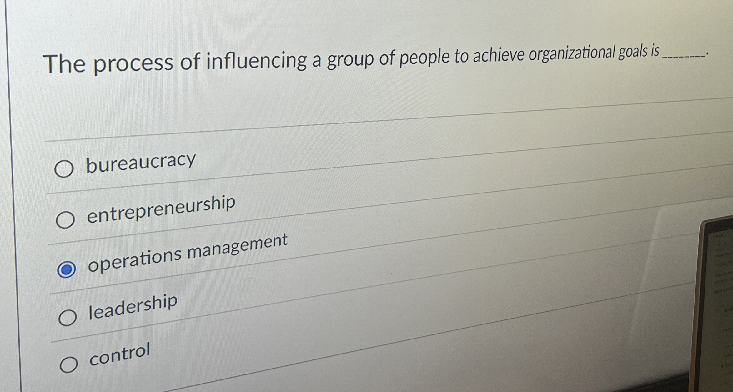 The process of influencing a group of people to