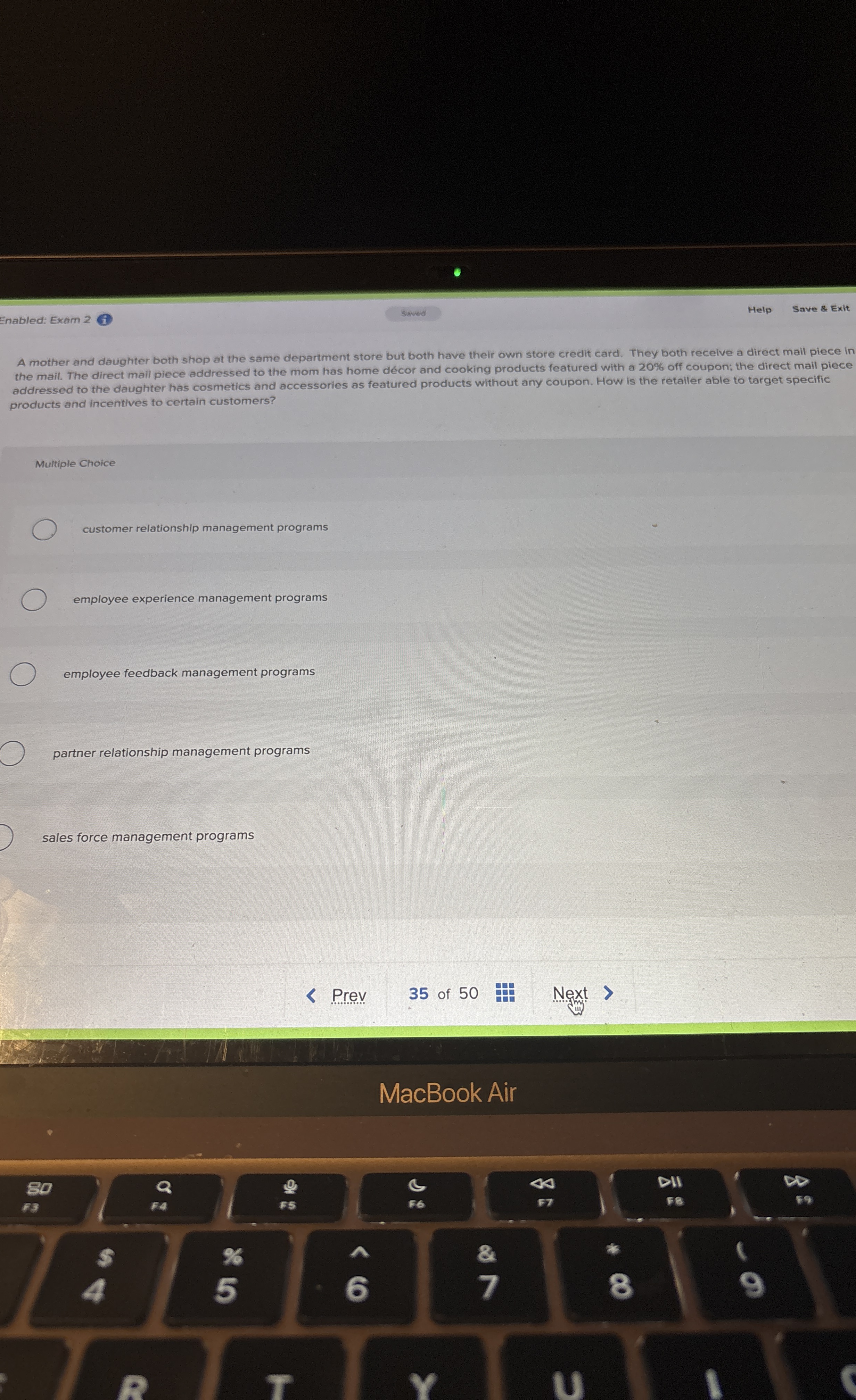 Enabled: Exam 2 Help Save & Exit A mother and