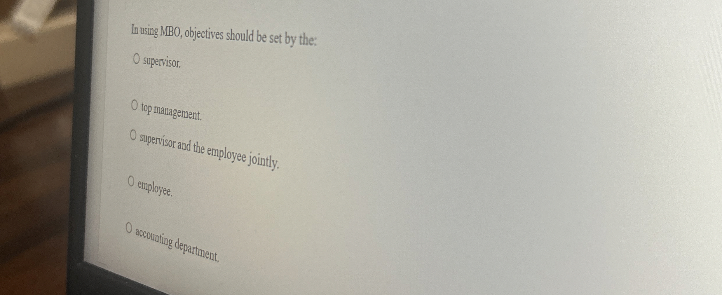 In using MBO, objectives should be set by the: 0