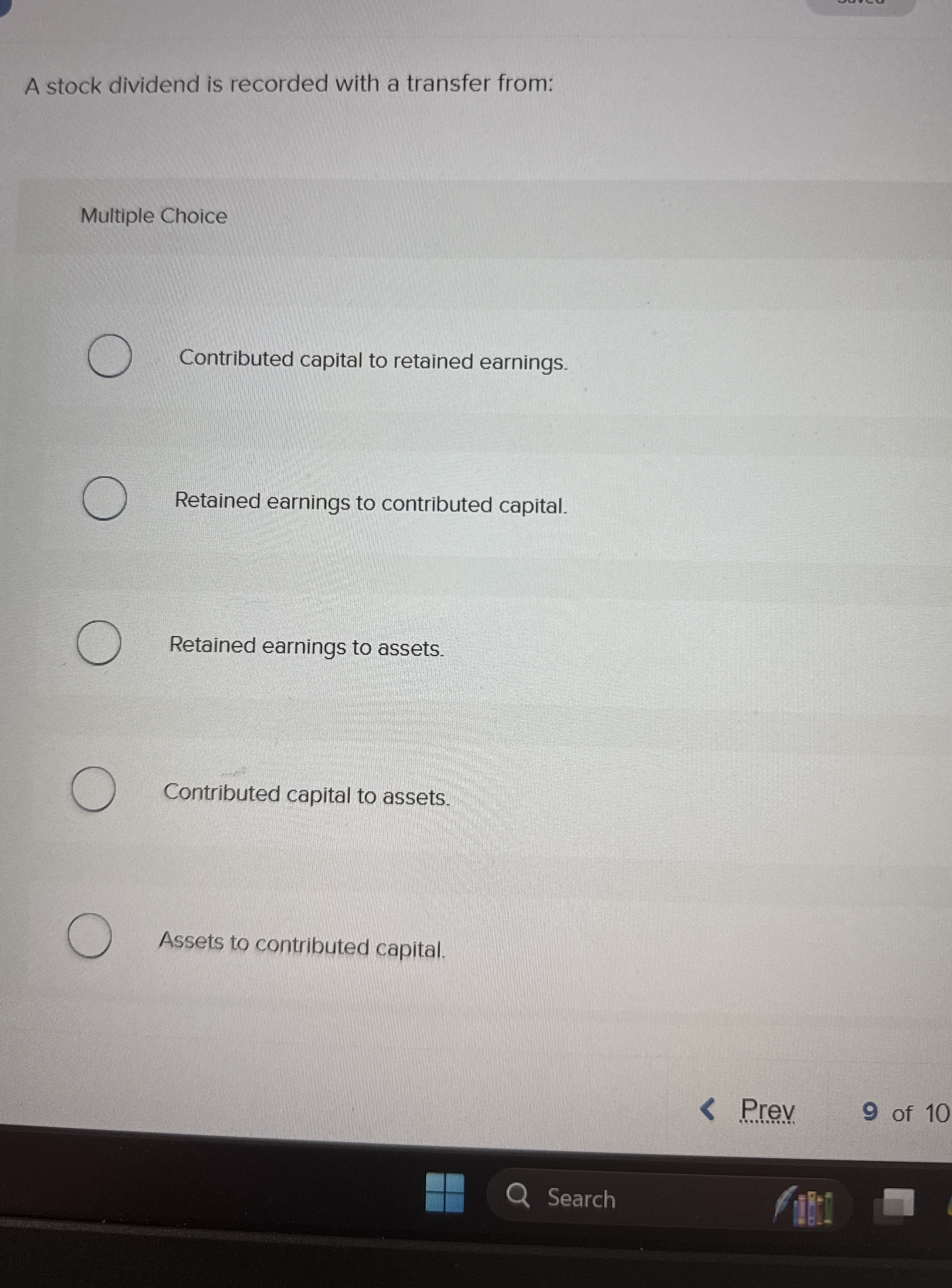 A stock dividend is recorded with a transfer