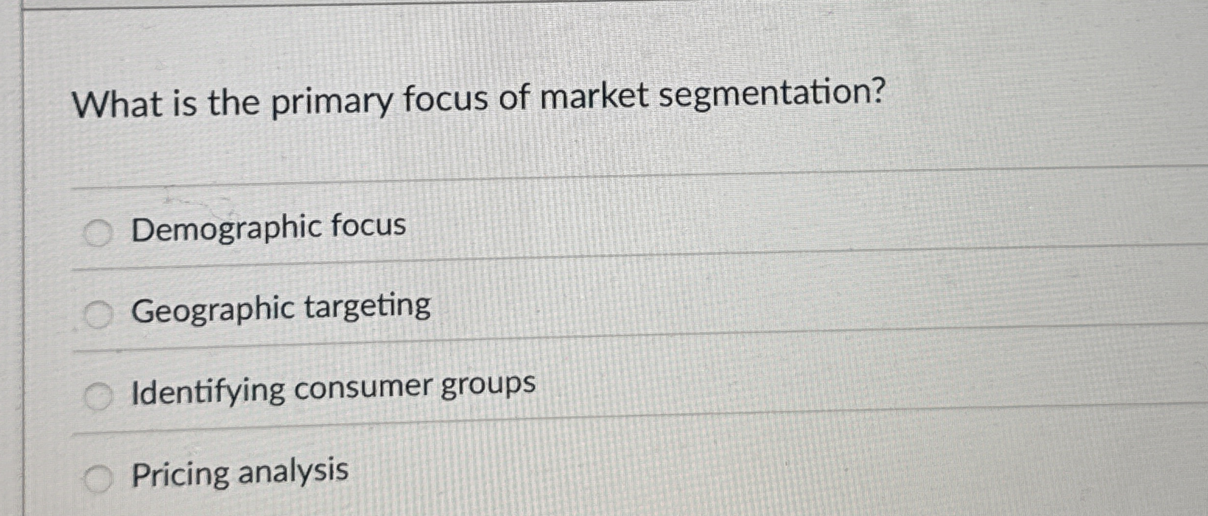 What is the primary focus of market segmentation?