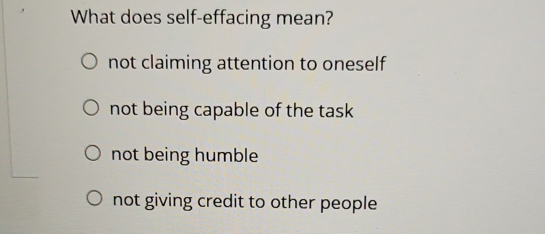 What does self - effacing mean? not claiming