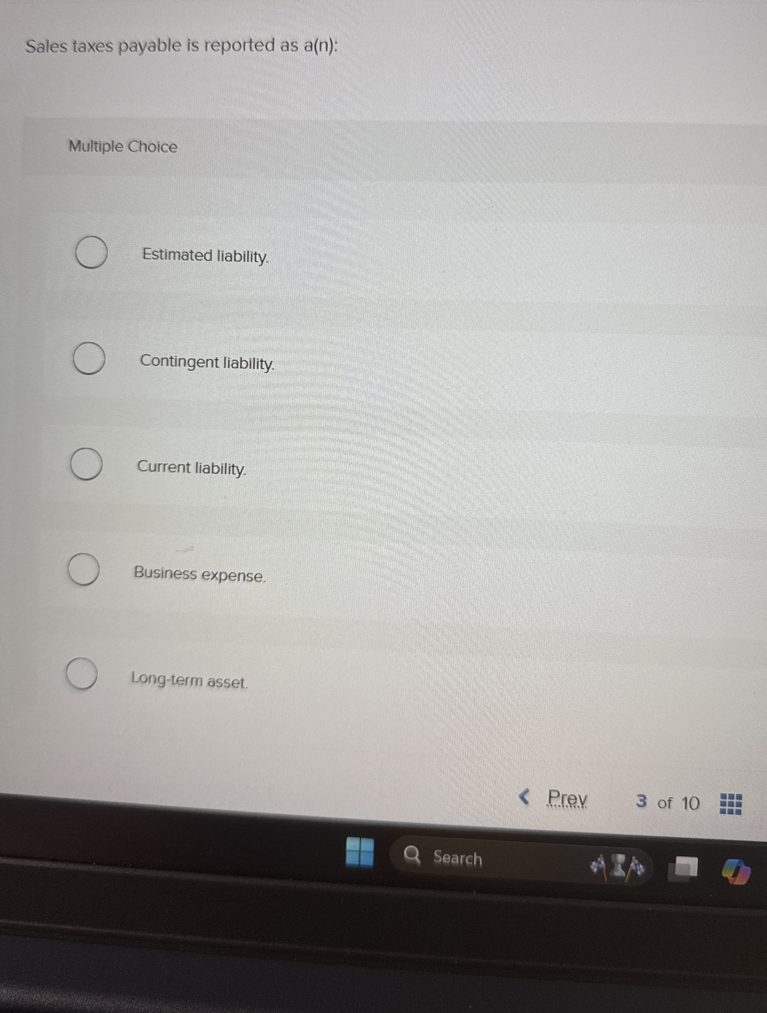 Sales taxes payable is reported as a ( n ) :