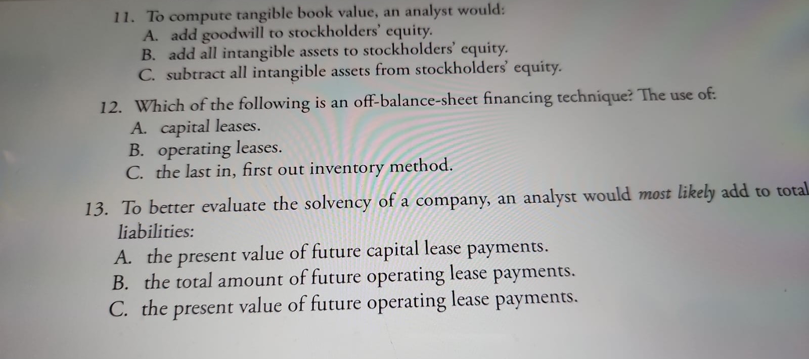 To compute tangible book value, an analyst would: