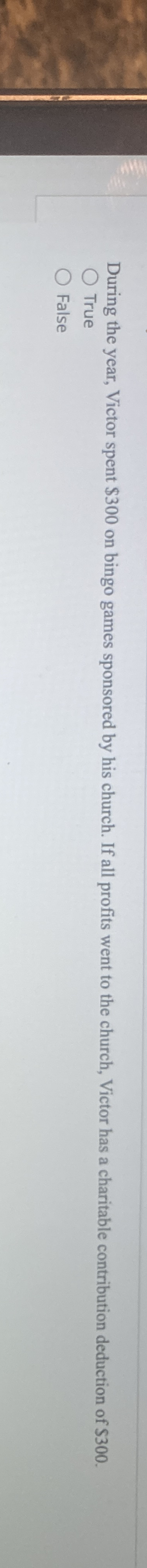 During the year, Victor spent $ 3 0 0 on bingo