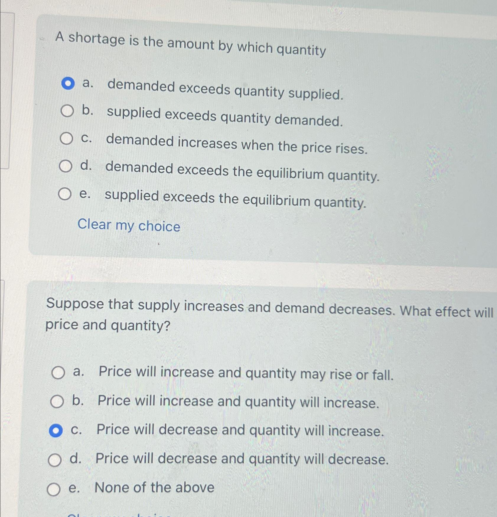 A shortage is the amount by which quantity a .