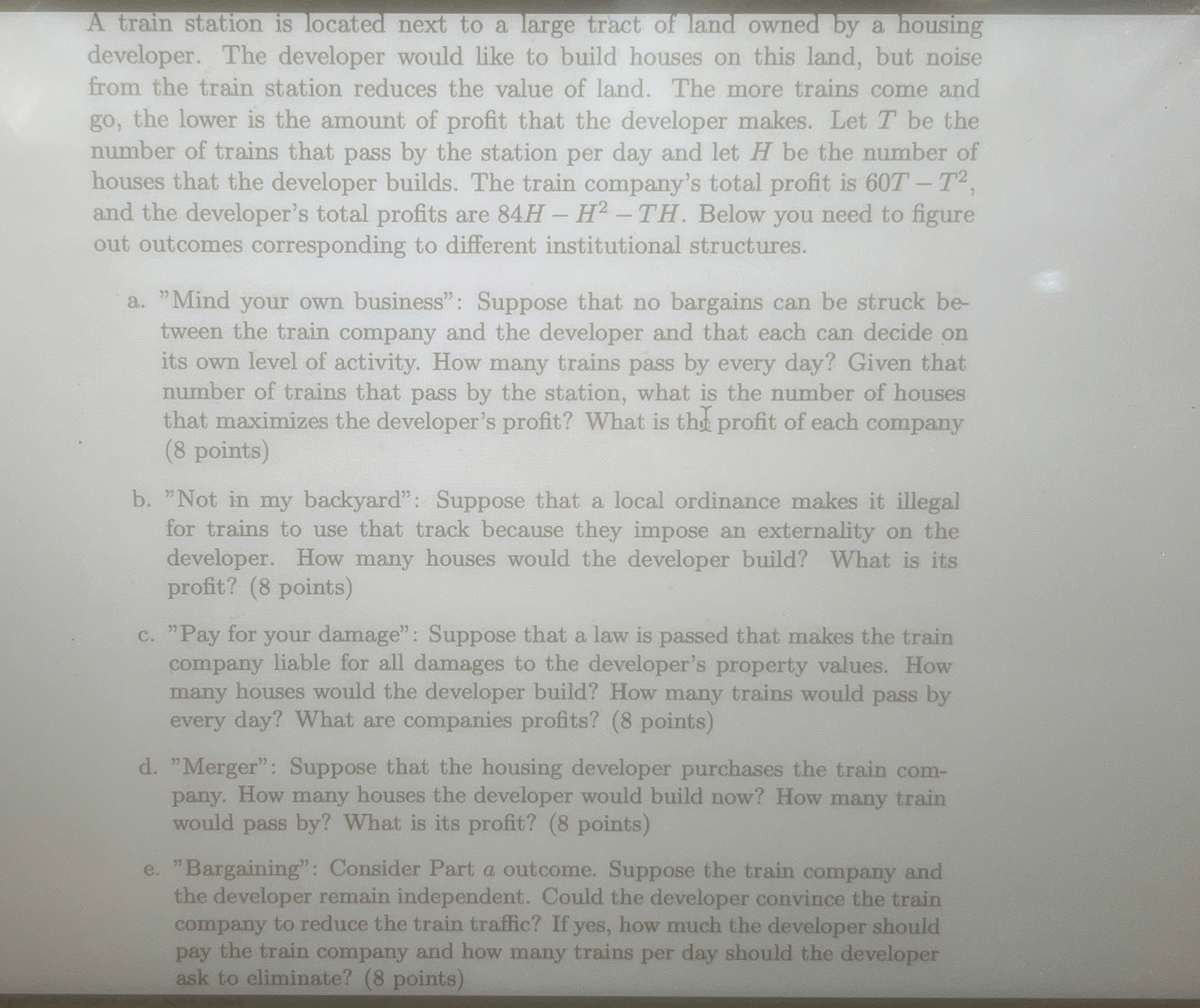 A train station is located next to a large tract