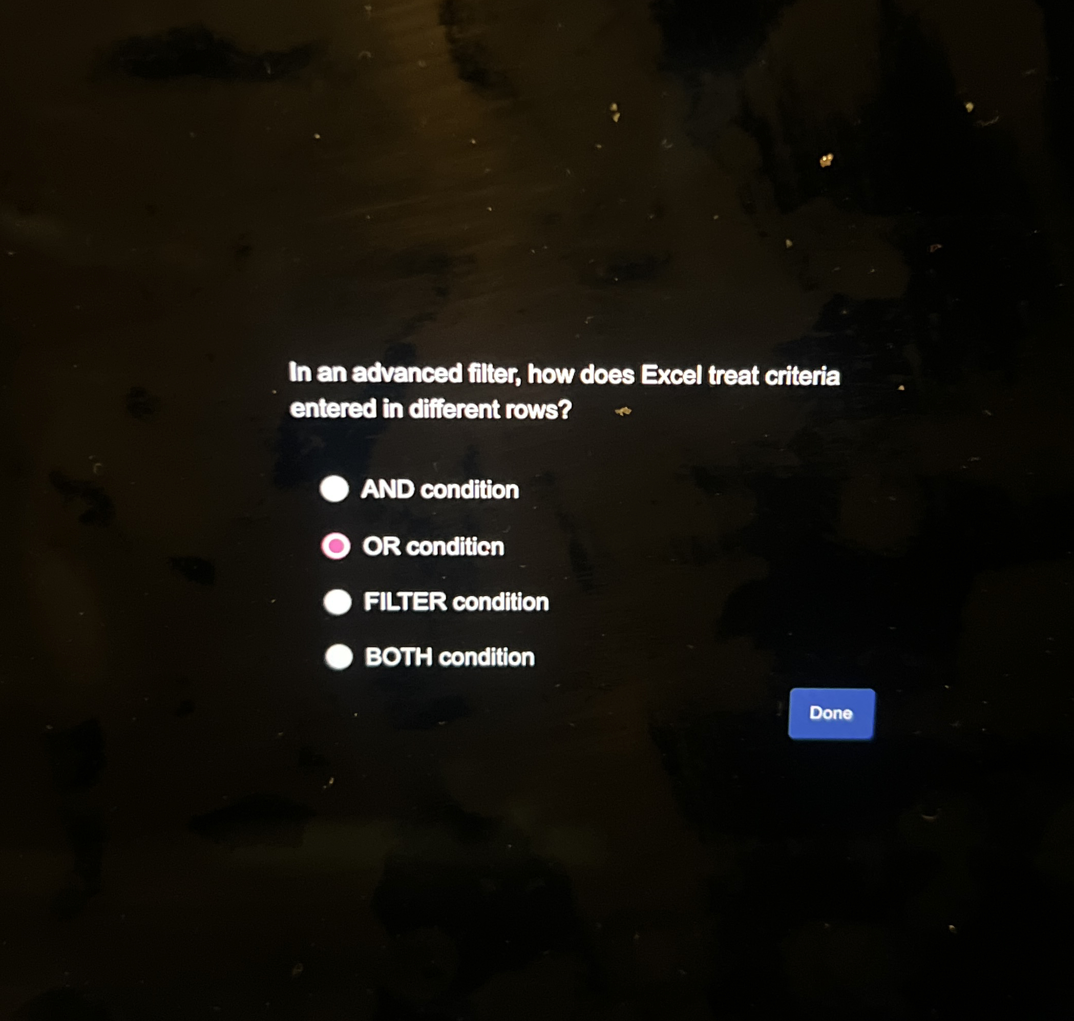 In an advanced filter, how does Excel treat