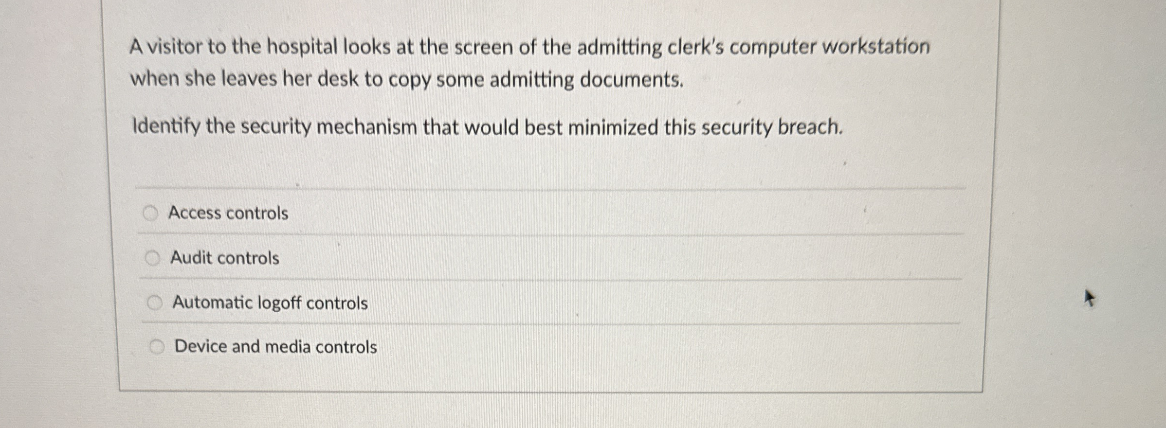 A visitor to the hospital looks at the screen of