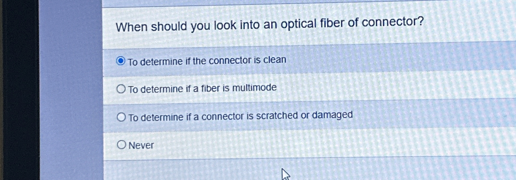 When should you look into an optical fiber of