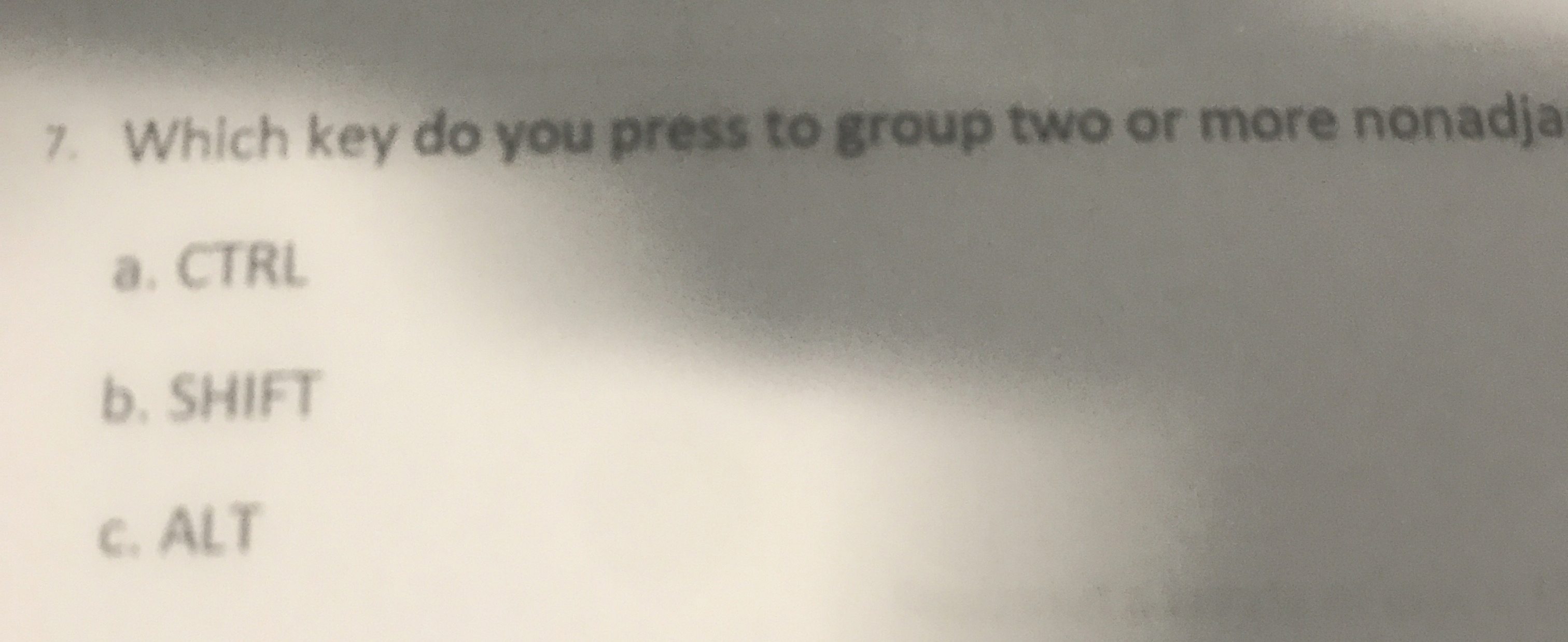 Which key do you press to group two or more
