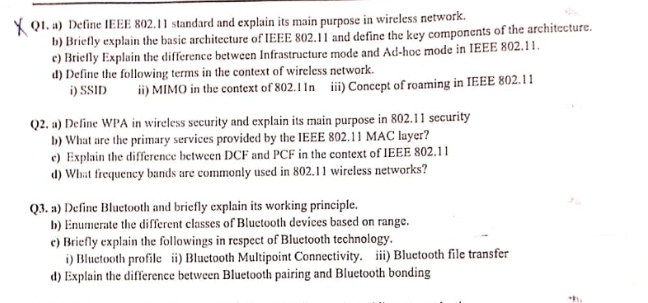 Q 1 . a ) Define IEEE 8 0 2 . 1 1 standard and