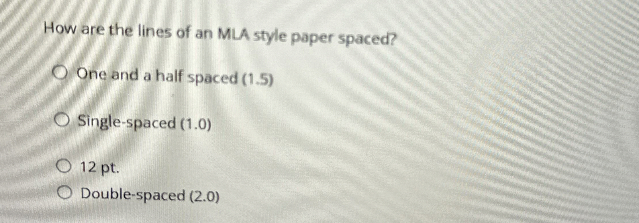 How are the lines of an MLA style paper spaced?