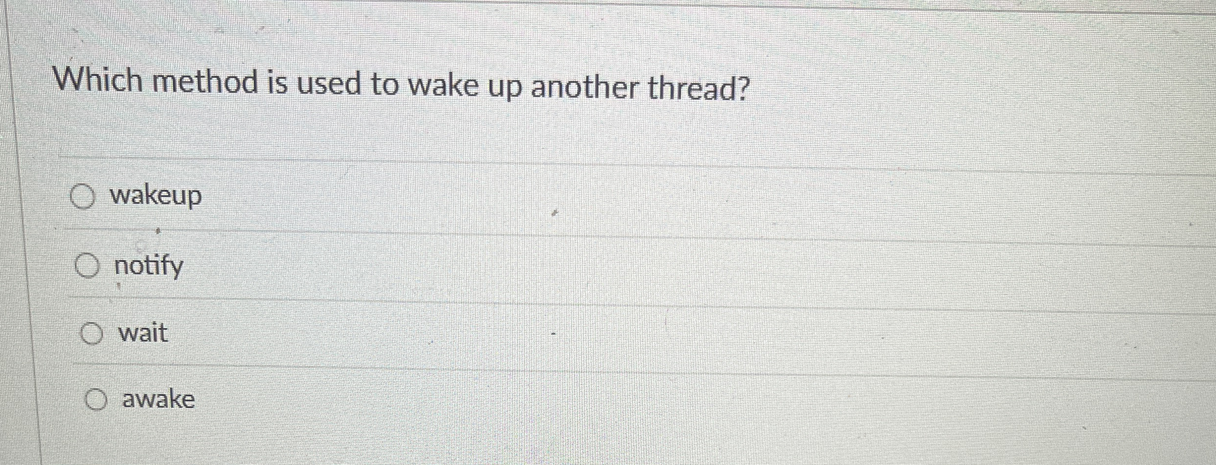 Which method is used to wake up another thread?
