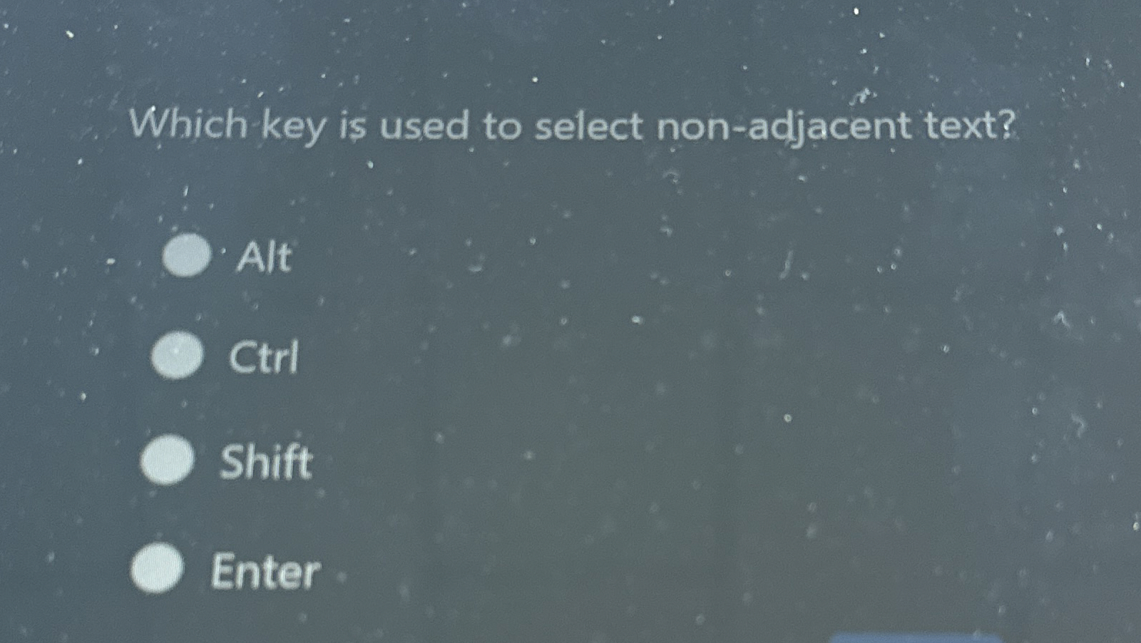 Which key is used to select non - adjacent text?