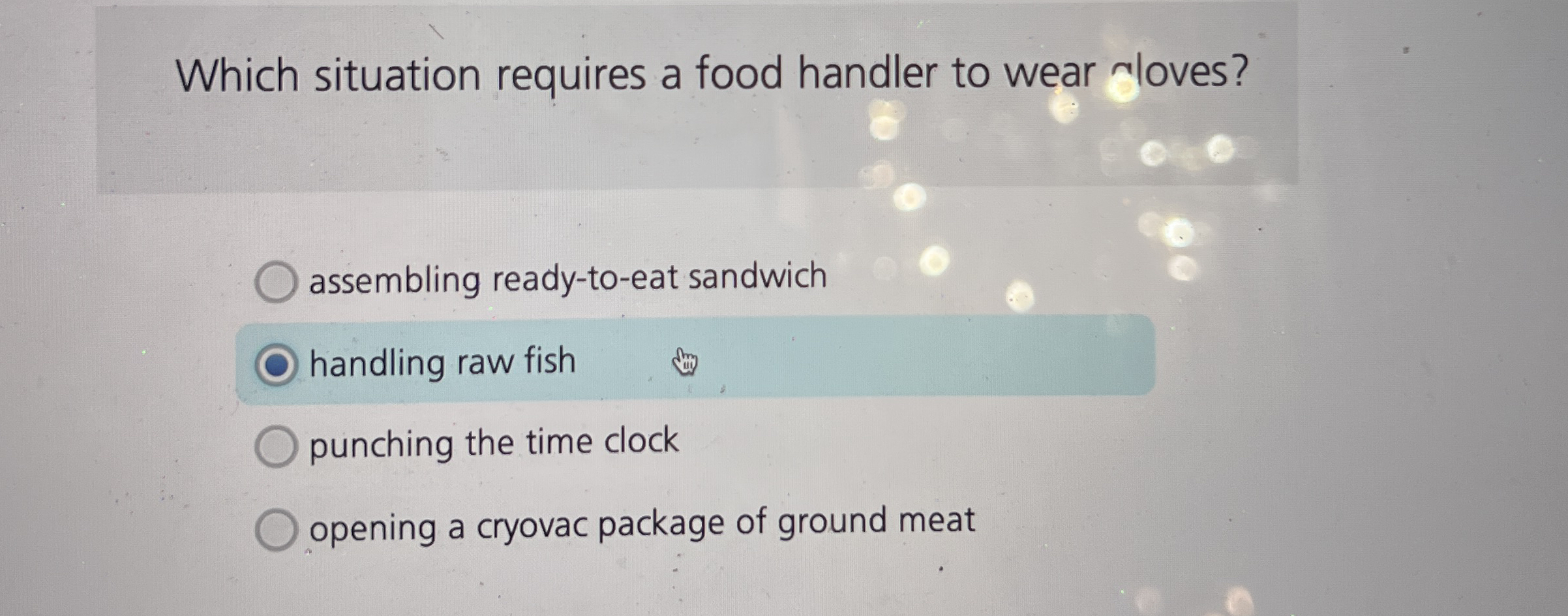 Which situation requires a food handler to wear
