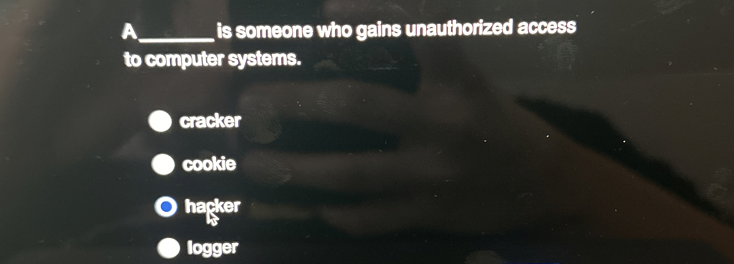 A is someone who gains unauthorized access to