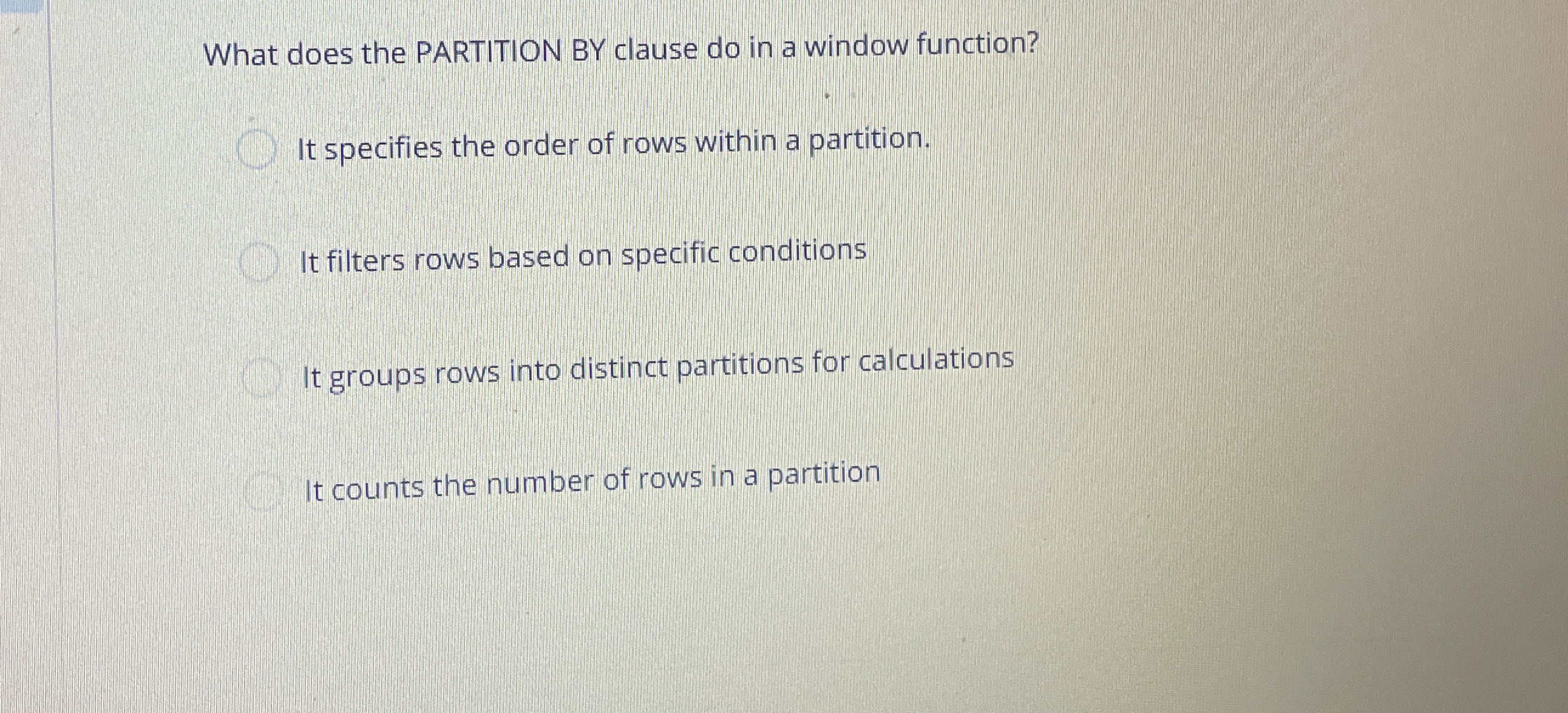 What does the PARTITION BY clause do in a window
