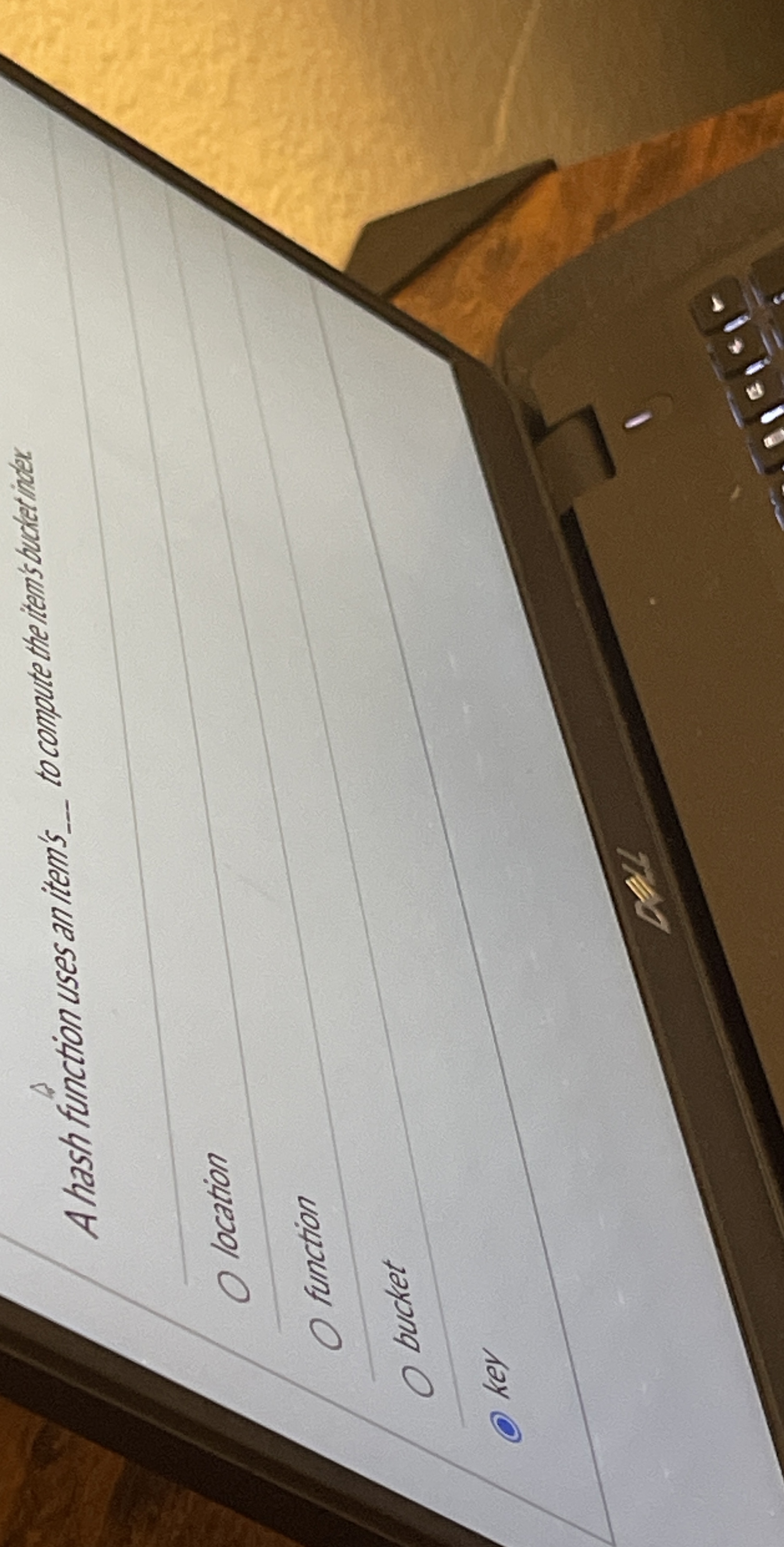 A hash function uses an item' to compute the item