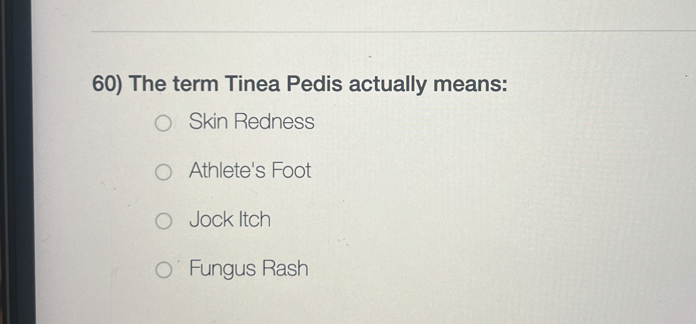 The term Tinea Pedis actually means: Skin Redness