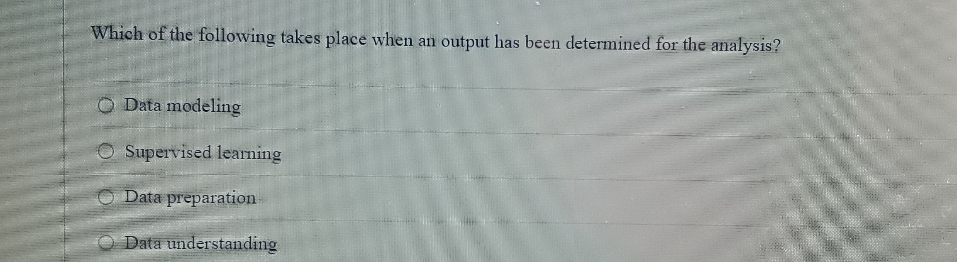 Which of the following takes place when an output