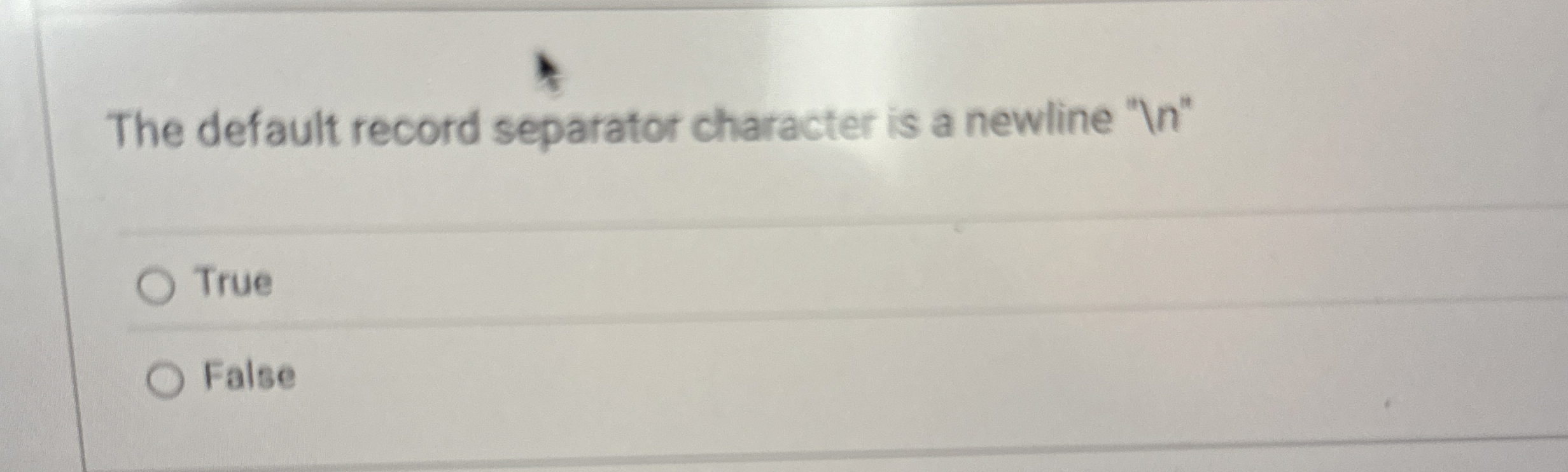 The default record separator character is a