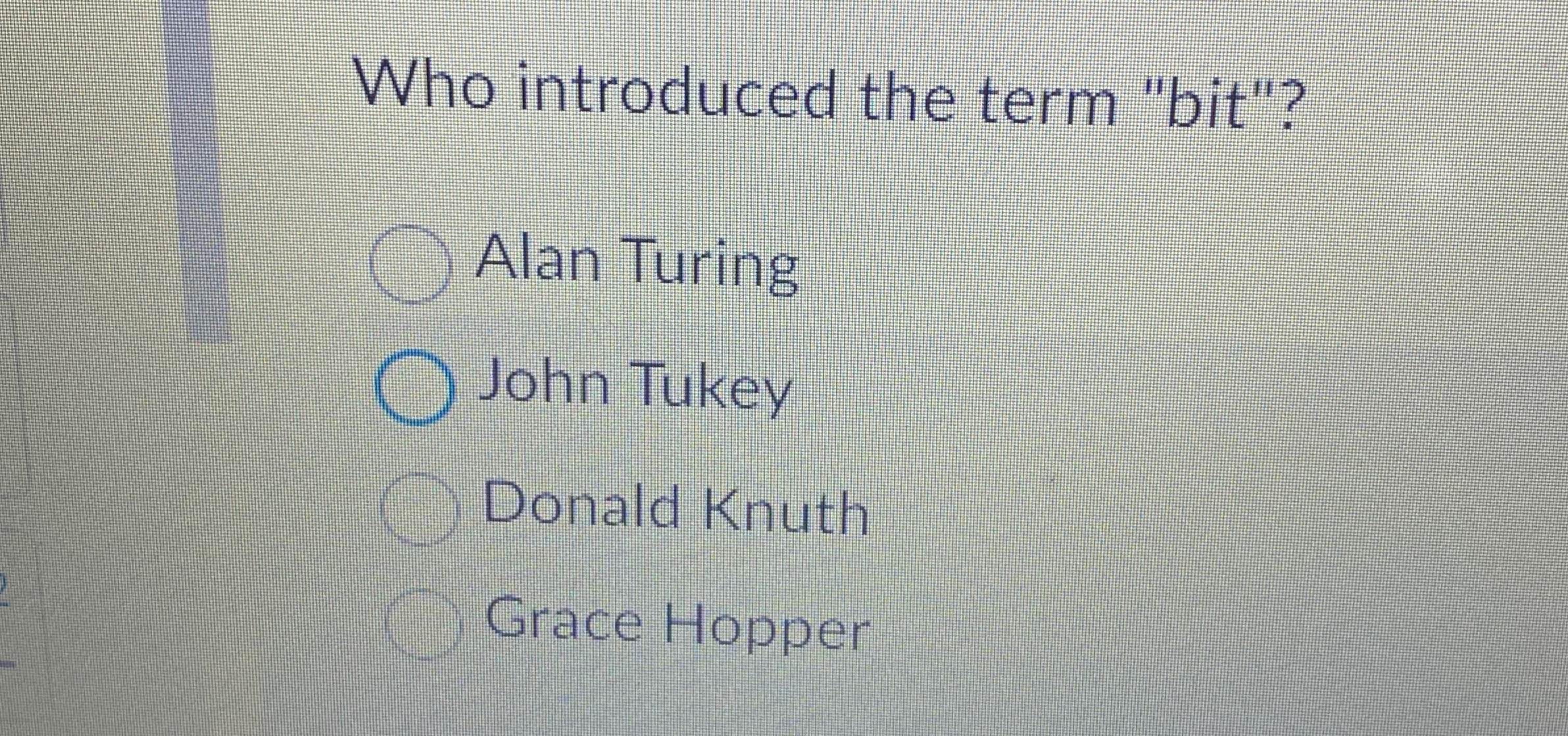Who introduced the term "bit"? Alan Turing John