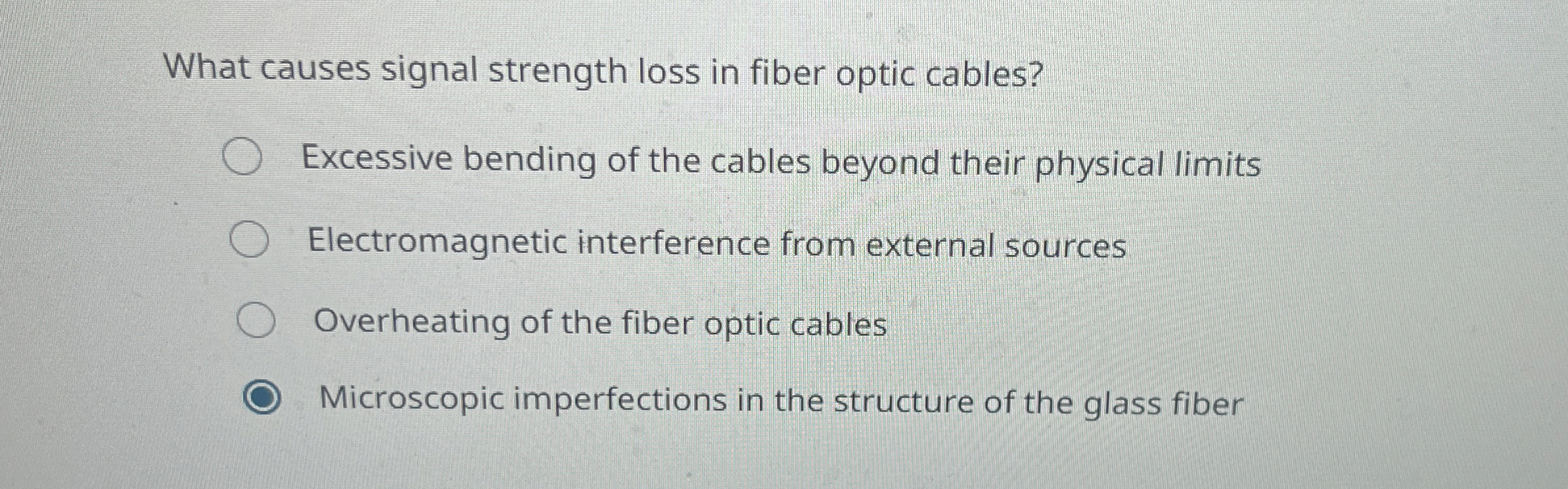 What causes signal strength loss in fiber optic