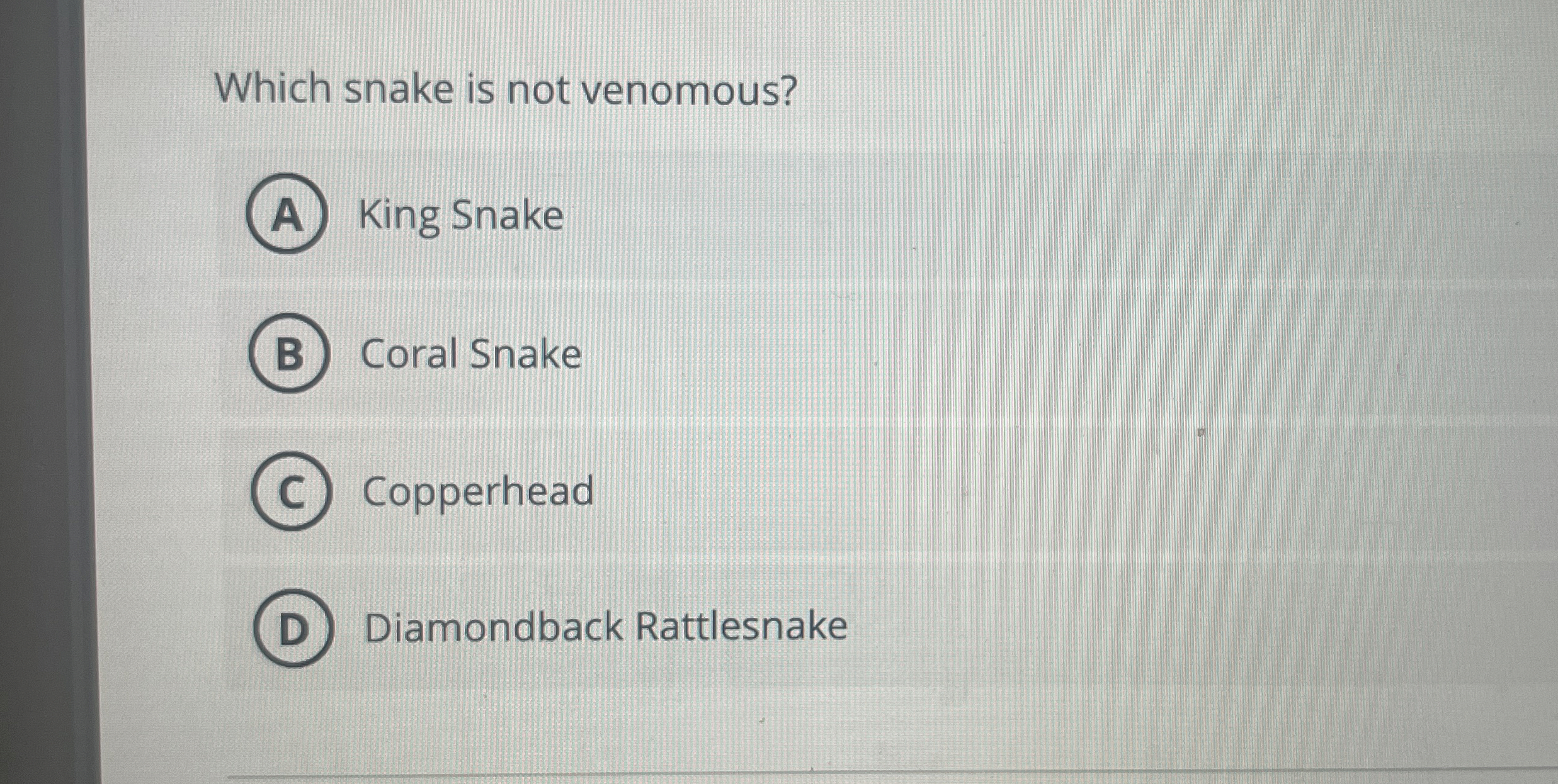 Which snake is not venomous? King Snake Coral