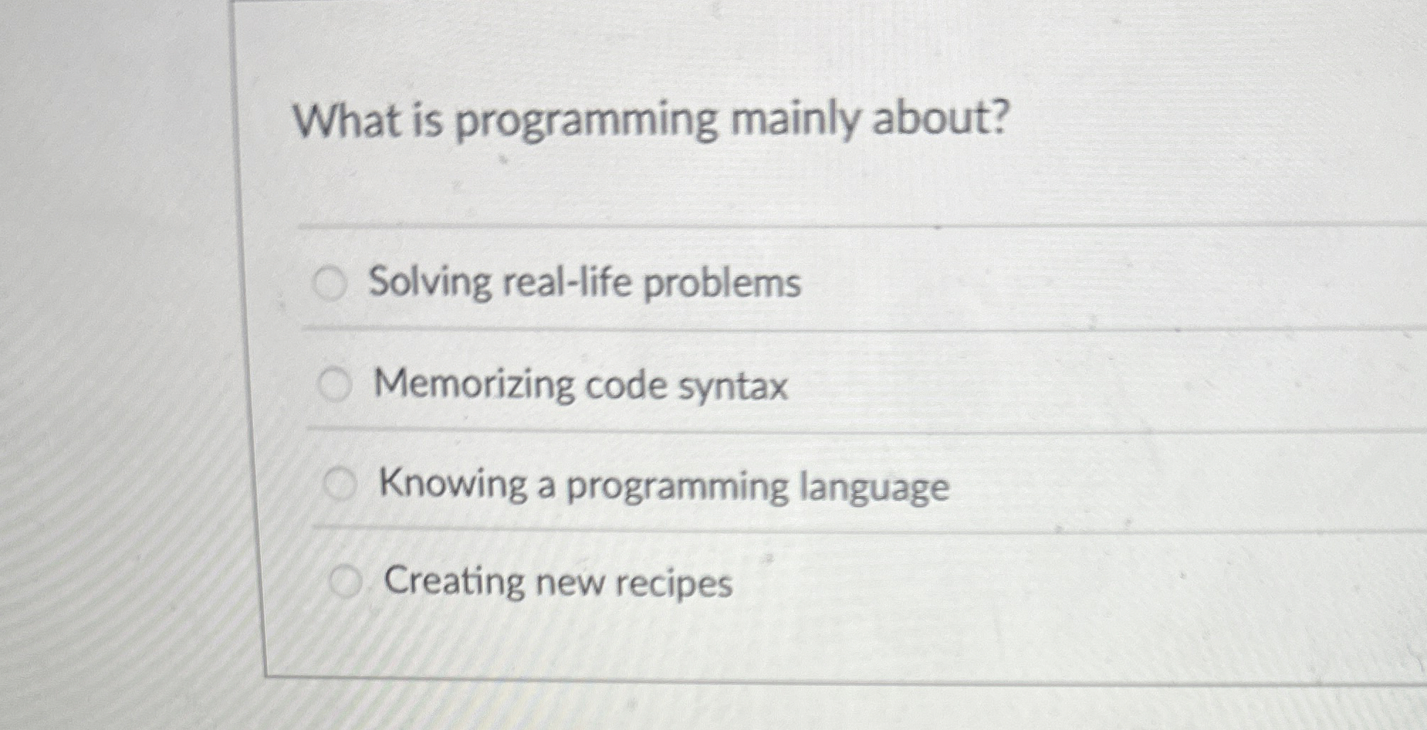What is programming mainly about? Solving real -