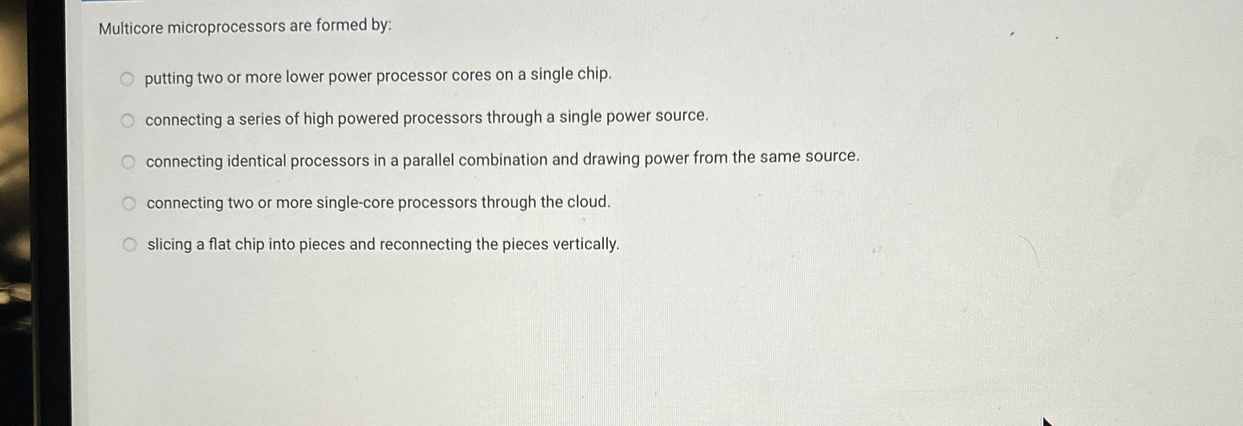 Multicore microprocessors are formed by: putting