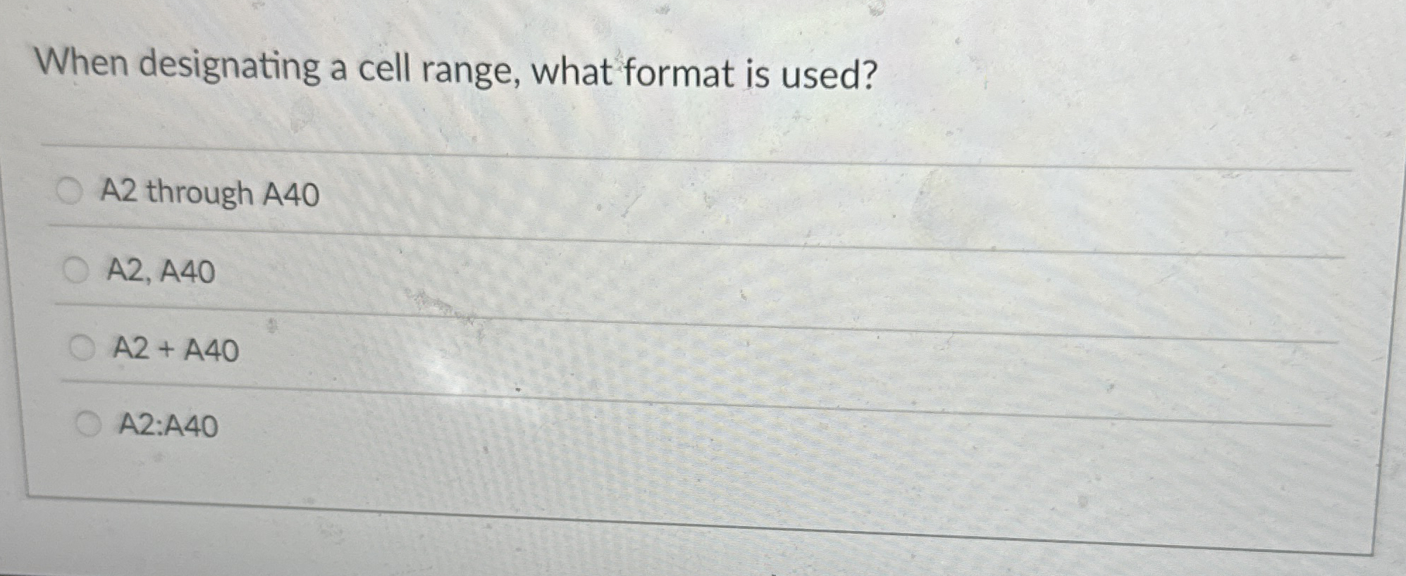 When designating a cell range, what format is