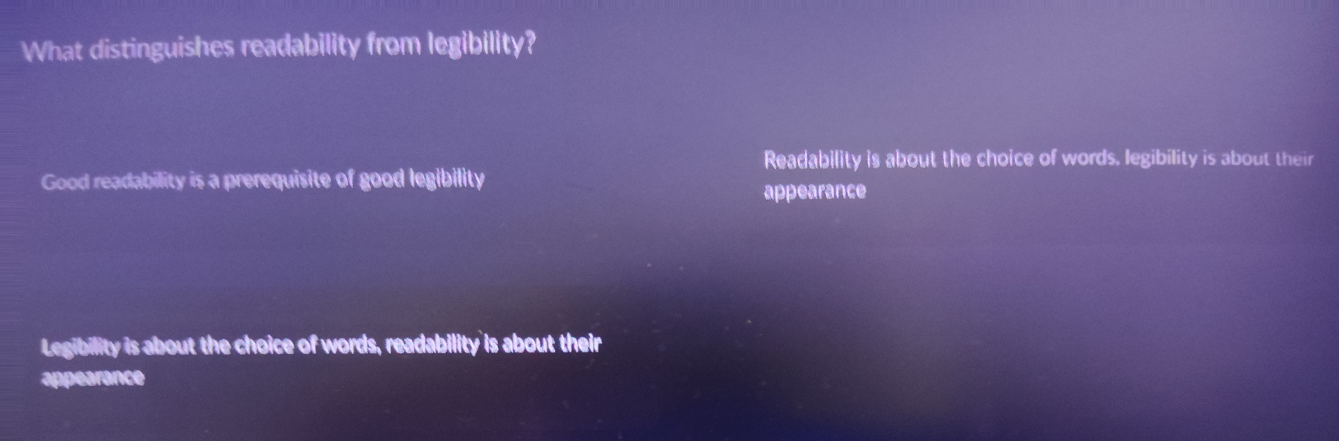 What distinguishes readability from legibillty?