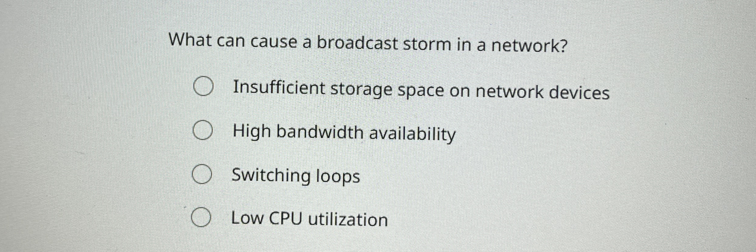 What can cause a broadcast storm in a network?