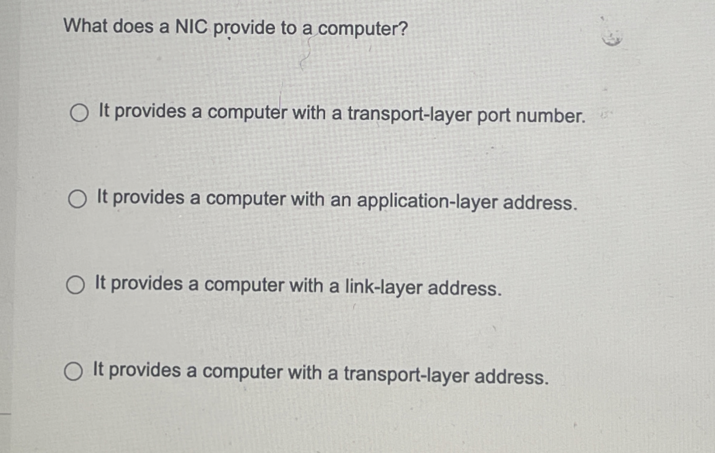 What does a NIC provide to a computer? It