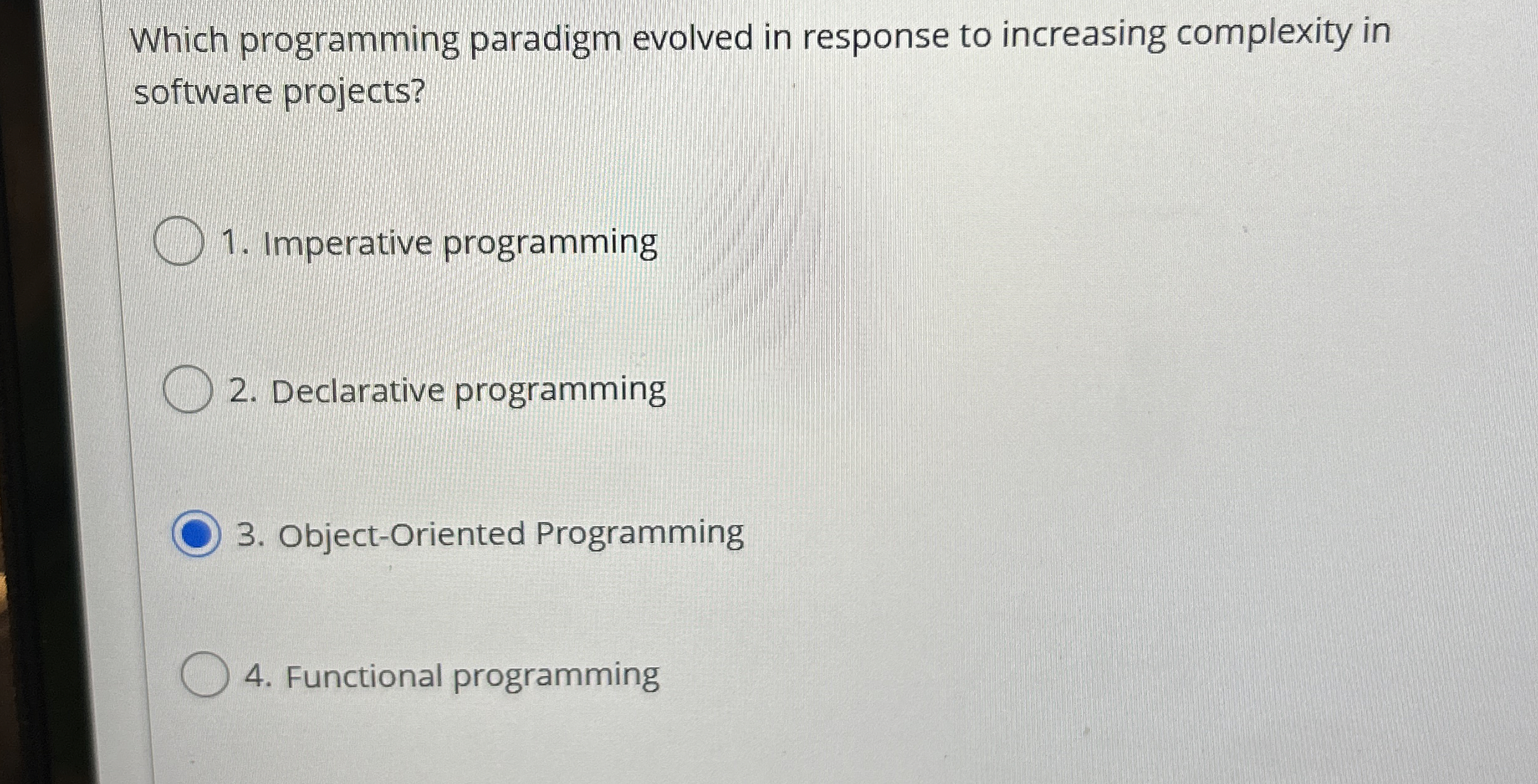 Which programming paradigm evolved in response to