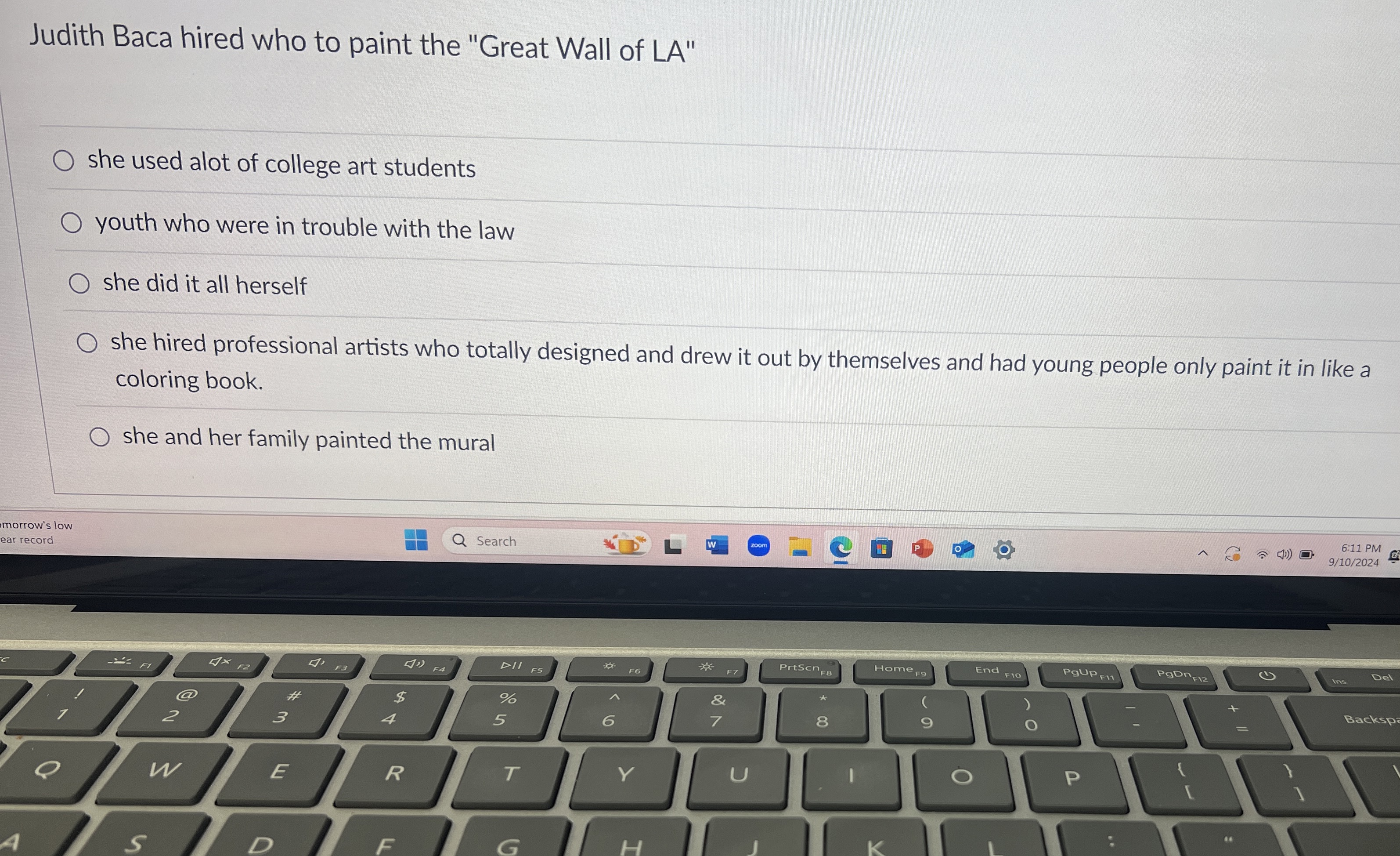 Judith Baca hired who to paint the "Great Wall of