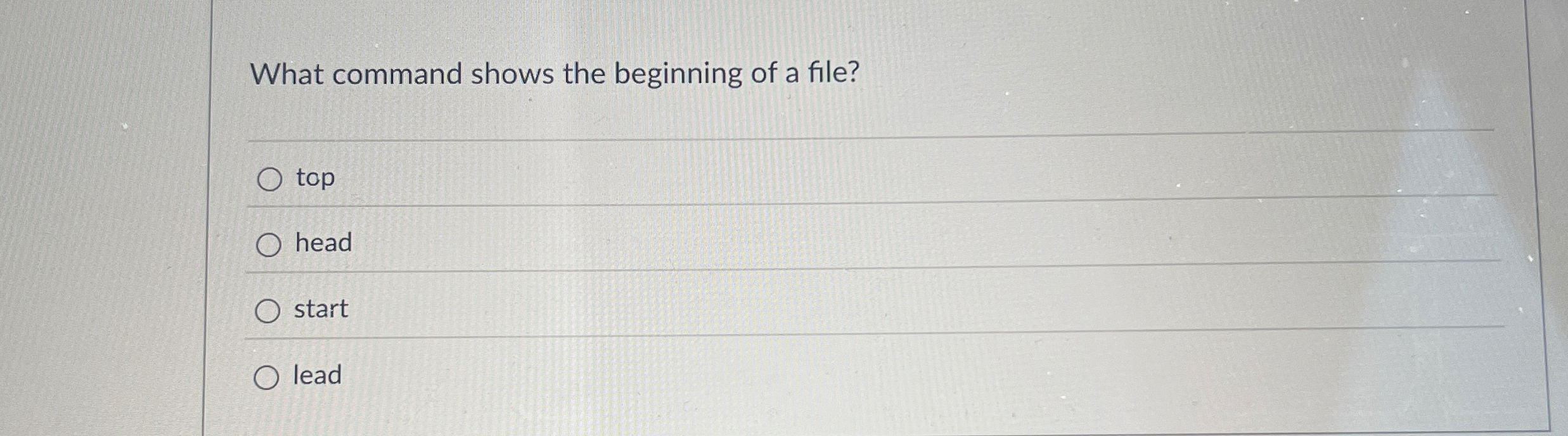 What command shows the beginning of a file? top