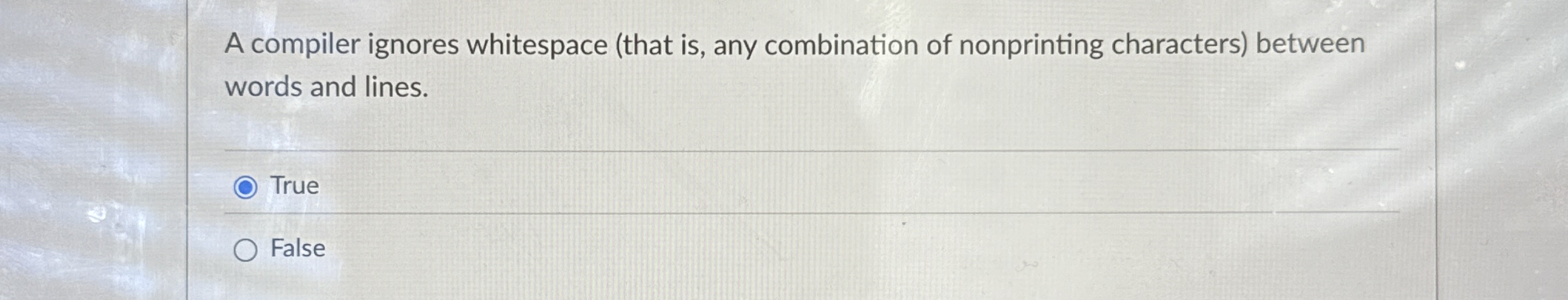 A compiler ignores whitespace ( that is , any
