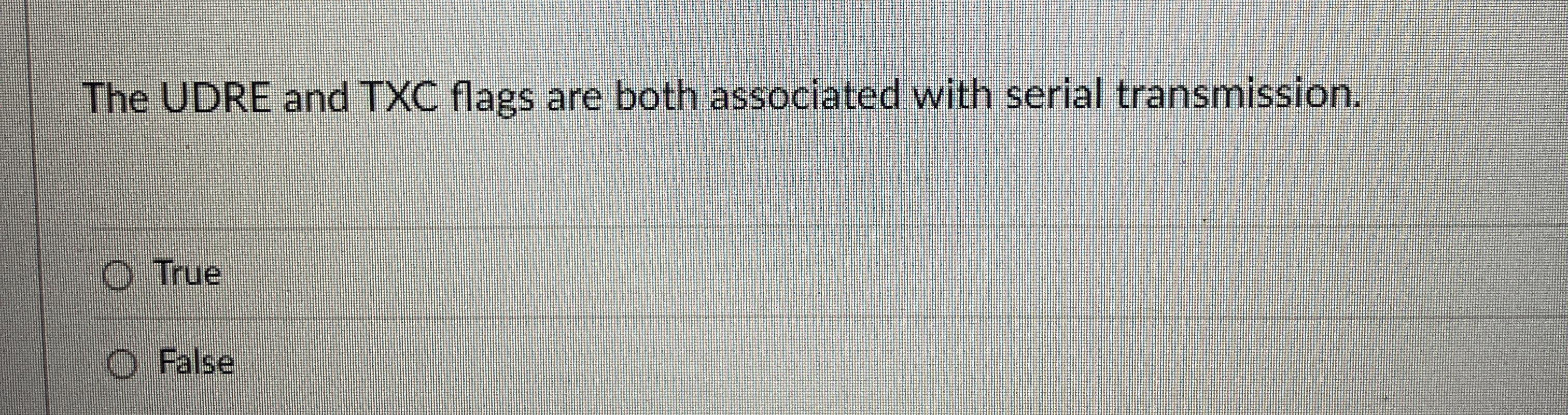 The UDRE and TXC flags are both associated with