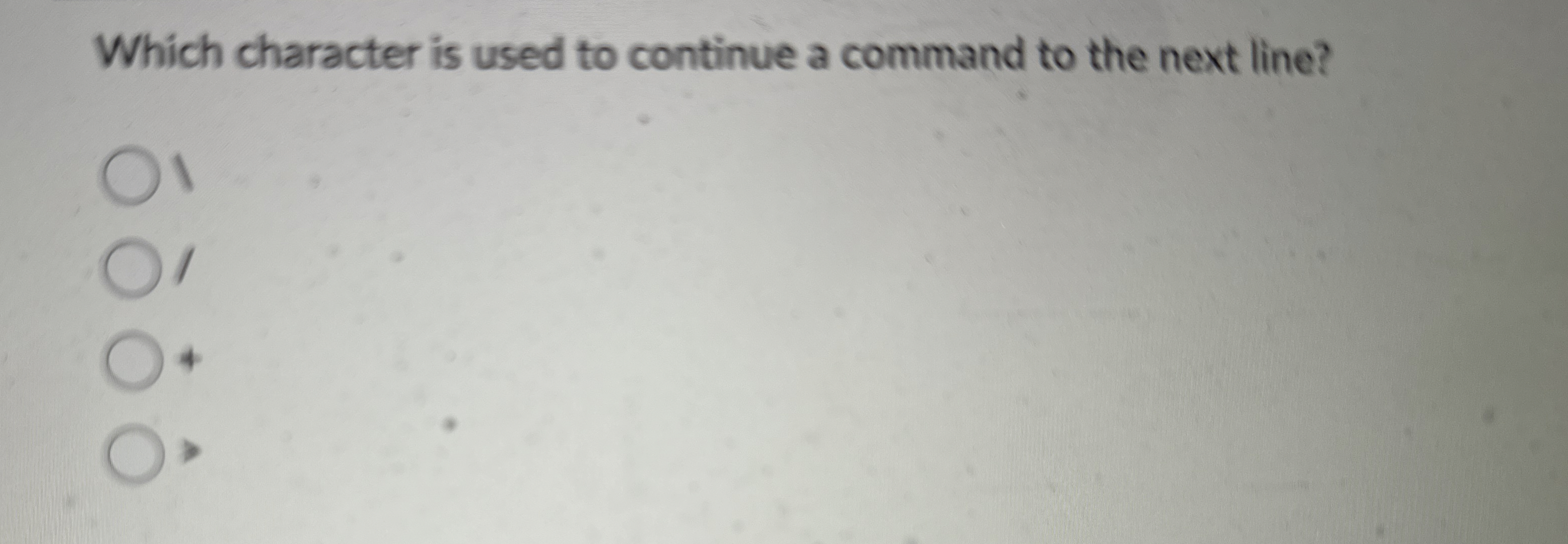 Which character is used to continue a command to