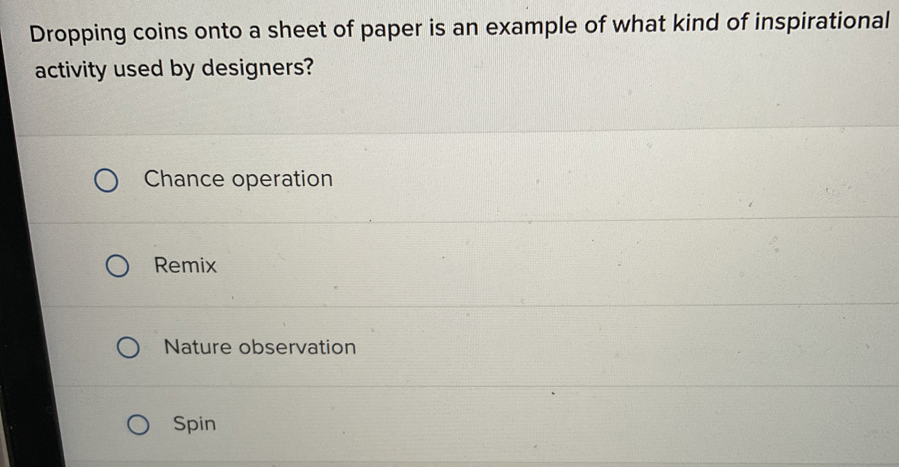 Dropping coins onto a sheet of paper is an