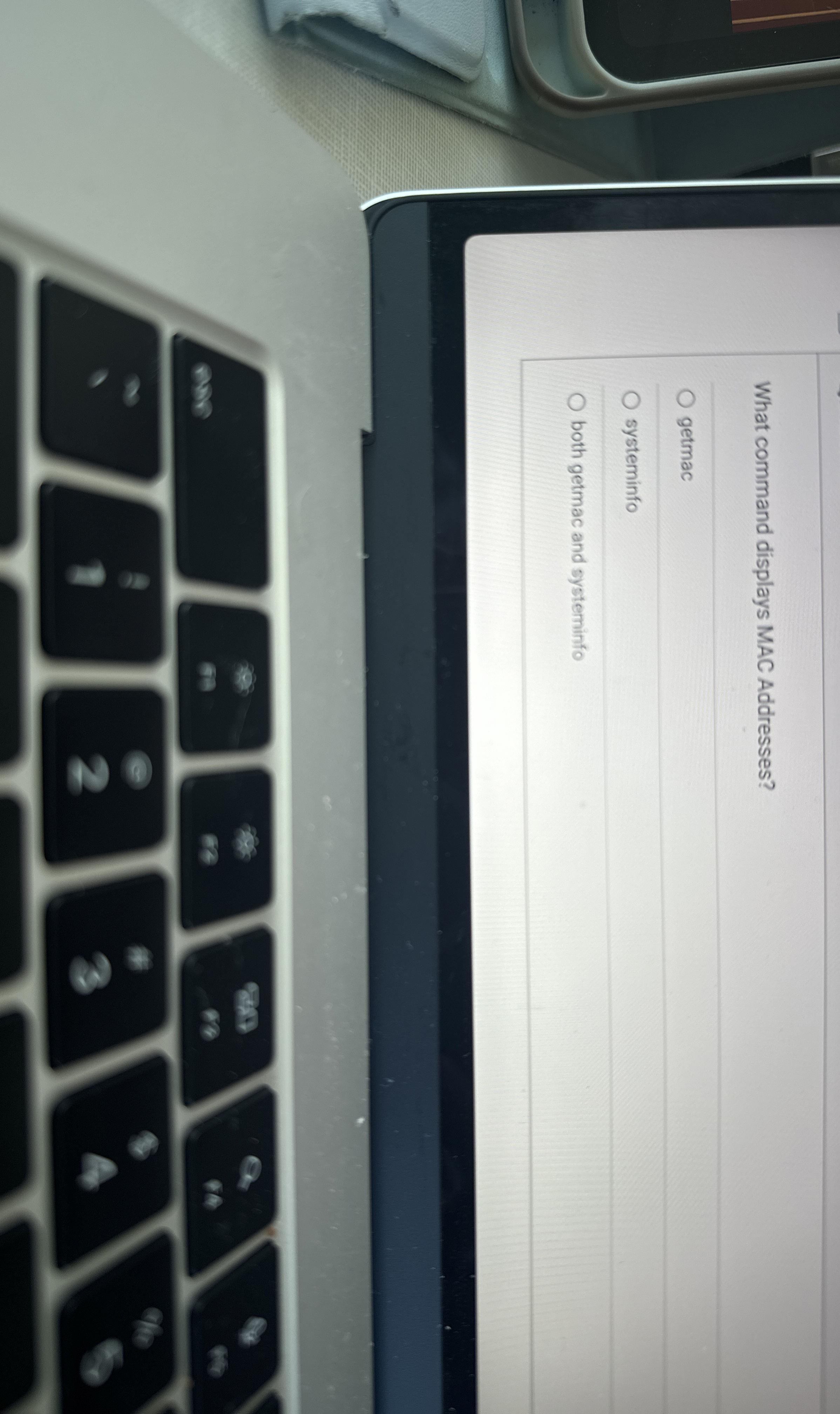 What command displays MAC Addresses? getmac