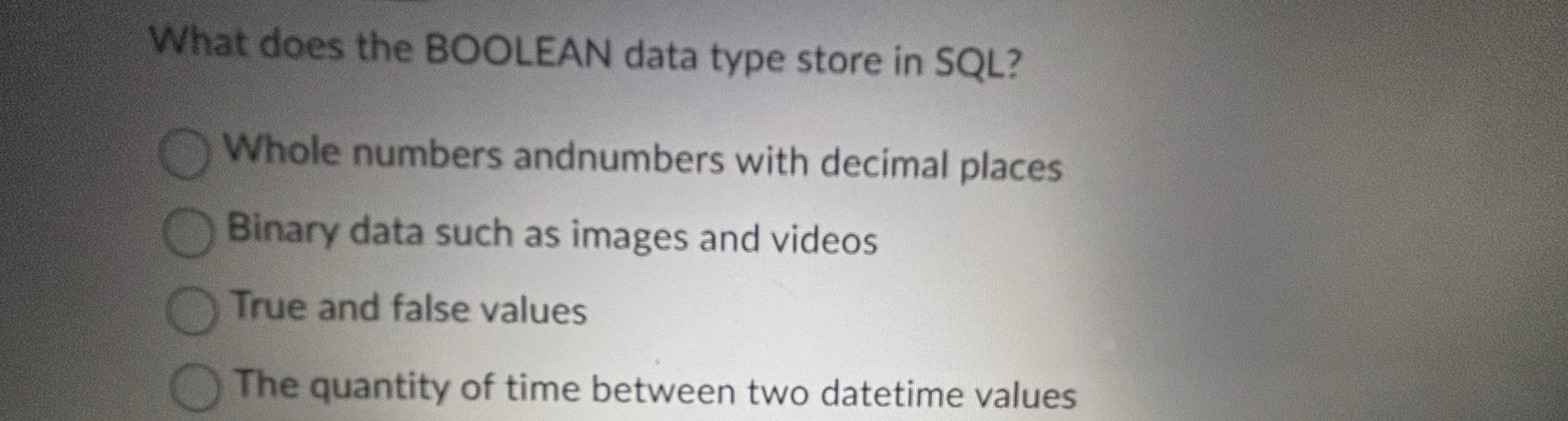 What does the BOOLEAN data type store in SQL ?