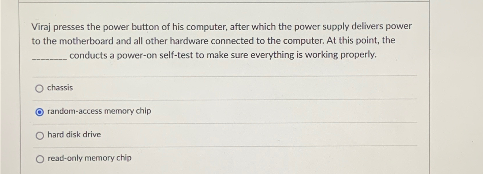 Viraj presses the power button of his computer,